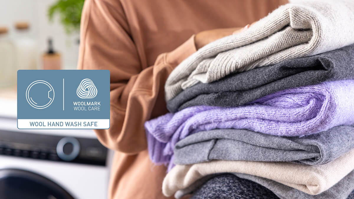 Women holding dryer clothes